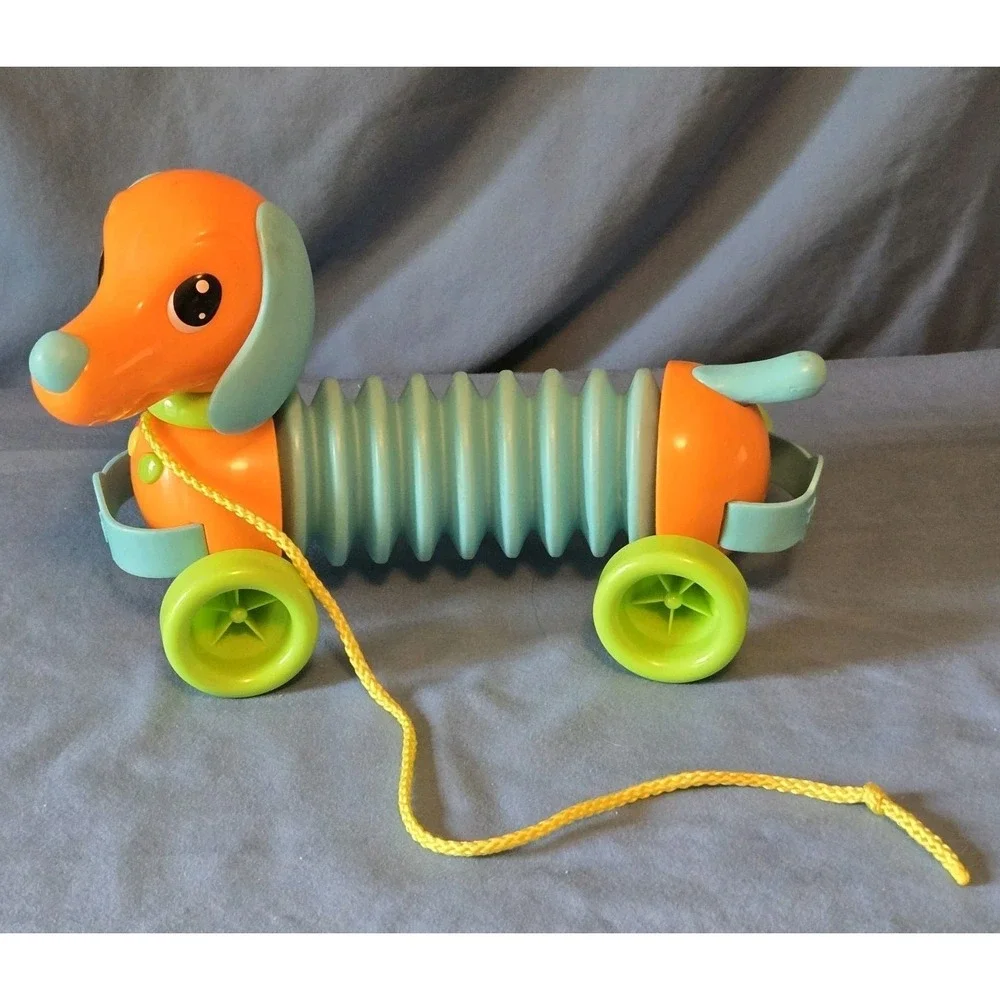 Tomy's  Marley The Musical Dog Plastic Pull Toy For Children 18M+